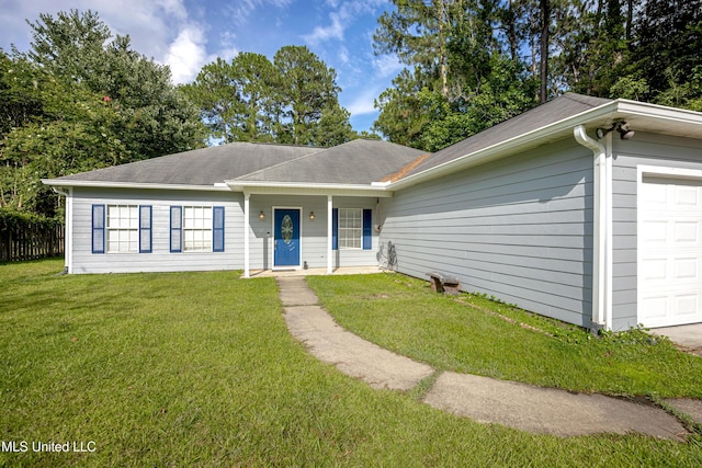 8002 Martin Bluff Rd, Gautier, MS 39553 - view of front of home with an attached garage and a front lawn