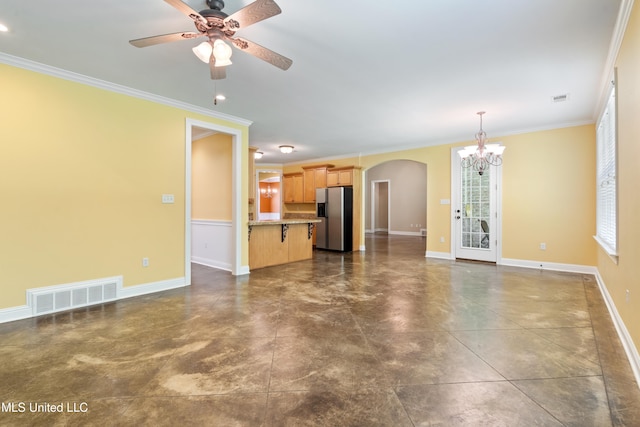 7672 N Rigmoore Pt, Olive Branch, MS 38654 - unfurnished living room featuring a chandelier, arched walkways, a ceiling fan, baseboards, and crown molding