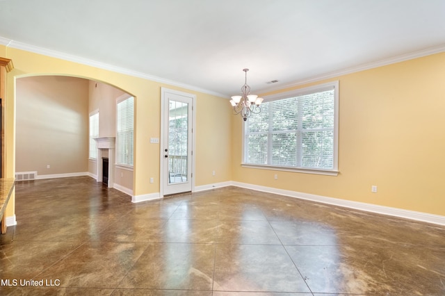 7672 N Rigmoore Pt, Olive Branch, MS 38654 - spare room featuring ornamental molding, a chandelier, a fireplace, baseboards, and arched walkways