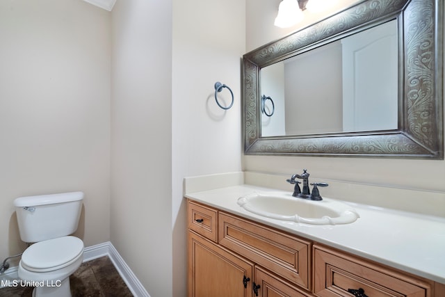 7672 N Rigmoore Pt, Olive Branch, MS 38654 - half bathroom with toilet, vanity, and baseboards