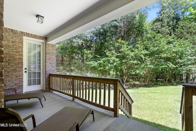 7672 N Rigmoore Pt, Olive Branch, MS 38654 - wooden deck with a lawn
