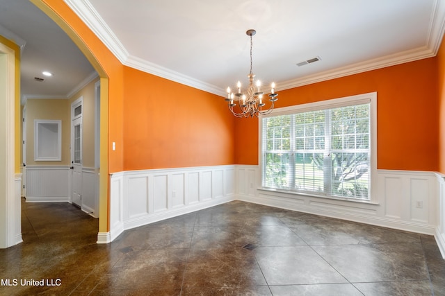 7672 N Rigmoore Pt, Olive Branch, MS 38654 - unfurnished dining area featuring arched walkways, wainscoting, a chandelier, a decorative wall, and ornamental molding