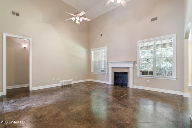 7672 N Rigmoore Pt, Olive Branch, MS 38654 - unfurnished living room featuring finished concrete flooring, high vaulted ceiling, a ceiling fan, baseboards, and a tiled fireplace
