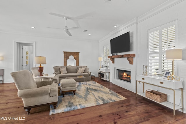 131 Camden Trl, Madison, MS 39110 - living room featuring crown molding, a large fireplace, ceiling fan, wood finished floors, and recessed lighting