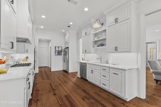 131 Camden Trl, Madison, MS 39110 - kitchen with appliances with stainless steel finishes, white cabinets, recessed lighting, backsplash, and ornamental molding