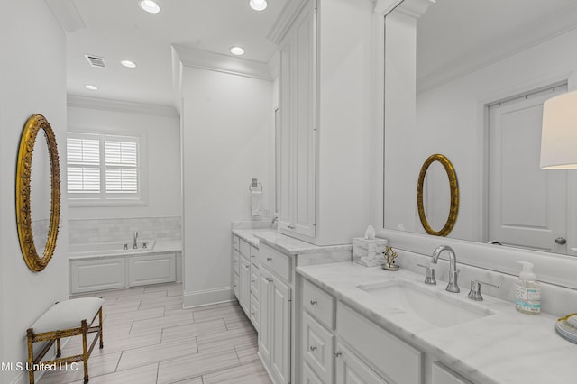 131 Camden Trl, Madison, MS 39110 - bathroom with vanity, ornamental molding, a bath, and recessed lighting