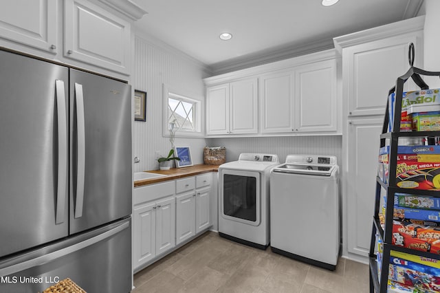 131 Camden Trl, Madison, MS 39110 - washroom featuring washing machine and clothes dryer, ornamental molding, cabinet space, and recessed lighting