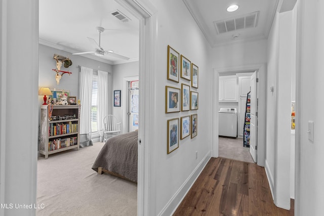 131 Camden Trl, Madison, MS 39110 - corridor with washer / dryer, ornamental molding, wood finished floors, and recessed lighting