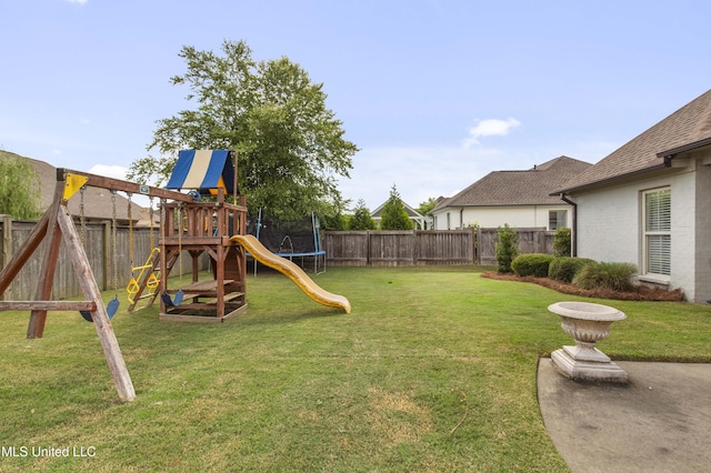 131 Camden Trl, Madison, MS 39110 - fenced backyard with a playground and a trampoline