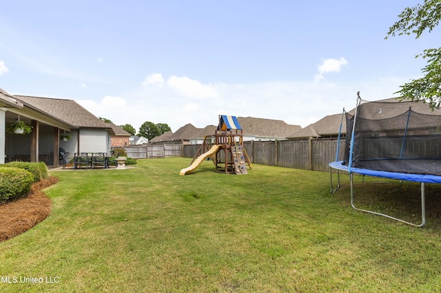 131 Camden Trl, Madison, MS 39110 - fenced backyard with a trampoline and a playground