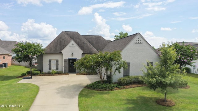 131 Camden Trl, Madison, MS 39110 - french country inspired facade featuring a front yard and concrete driveway