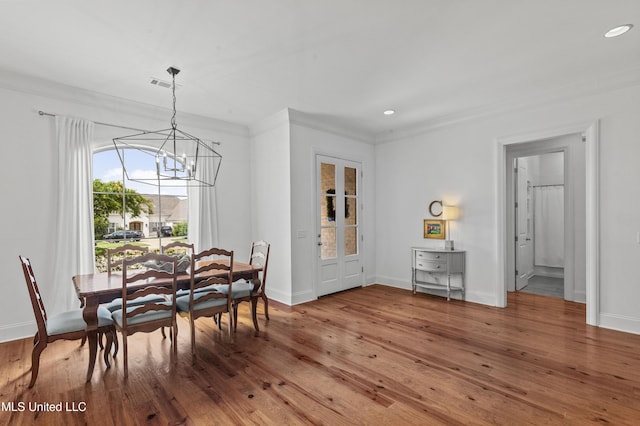 131 Camden Trl, Madison, MS 39110 - dining area featuring a chandelier, hardwood / wood-style flooring, ornamental molding, and recessed lighting