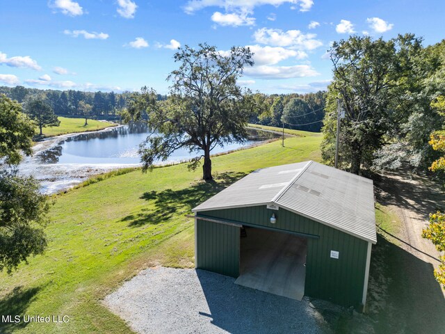 drone / aerial view featuring a water view