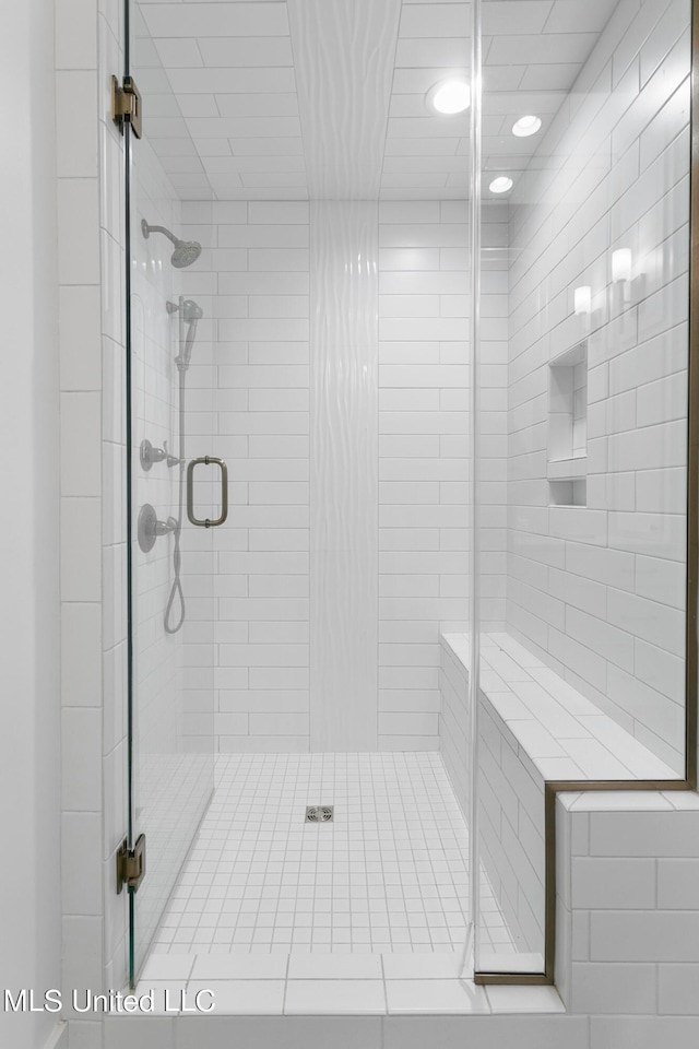 bathroom with an enclosed shower