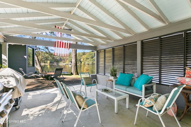 view of patio featuring an outdoor living space and a water view