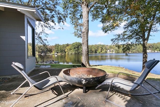 view of patio with a water view