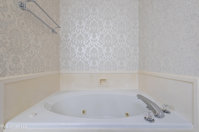 162 Apple Blossom Dr, Brandon, MS 39047 - bathroom with wallpapered walls and a tub with jets