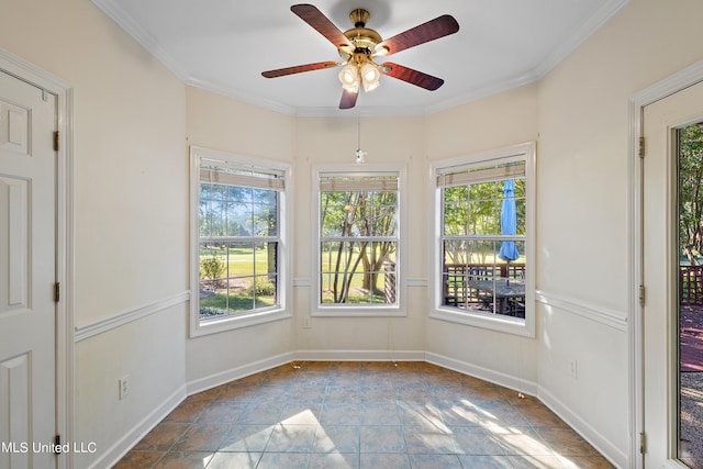 unfurnished sunroom featuring a wealth of natural light and ceiling fan