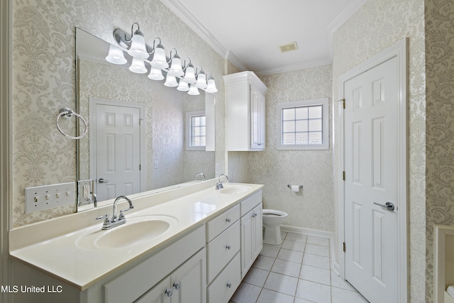 bathroom with vanity, ornamental molding, toilet, and tile patterned flooring