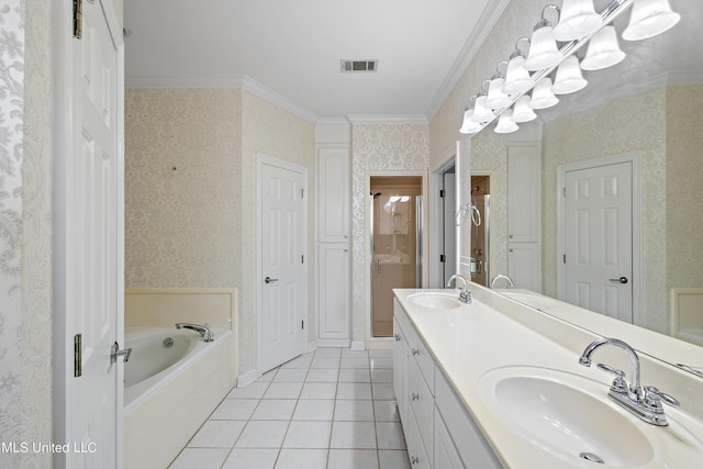 bathroom featuring vanity, crown molding, tiled bath, and tile patterned flooring