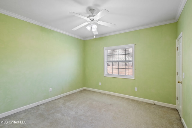 empty room with crown molding, light colored carpet, and ceiling fan