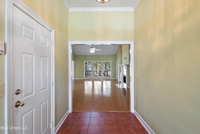 162 Apple Blossom Dr, Brandon, MS 39047 - hallway featuring baseboards, crown molding, dark tile patterned flooring, and a towering ceiling