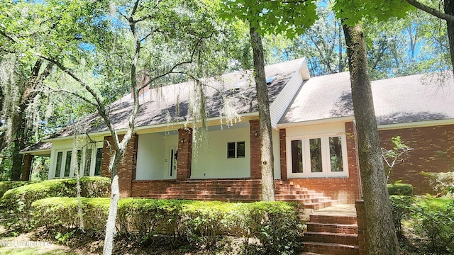 11 Aberdeen Rd, Natchez, MS 39120 - view of front of property with brick siding and roof with shingles