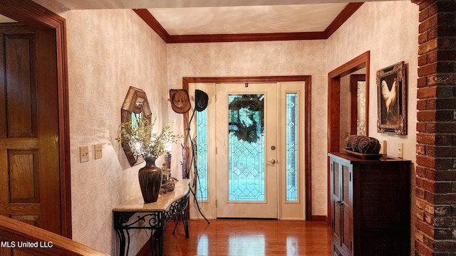 11 Aberdeen Rd, Natchez, MS 39120 - foyer featuring wood finished floors, ornamental molding, baseboards, and plenty of natural light