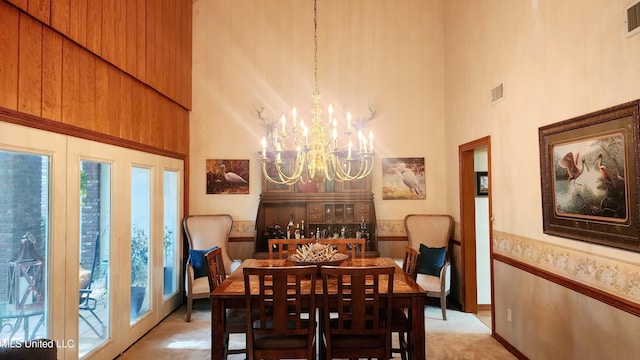 11 Aberdeen Rd, Natchez, MS 39120 - dining room with a high ceiling and a chandelier