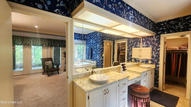 bathroom with vanity and crown molding