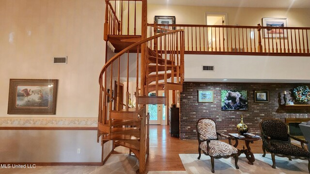 11 Aberdeen Rd, Natchez, MS 39120 - stairway with wood finished floors and a towering ceiling