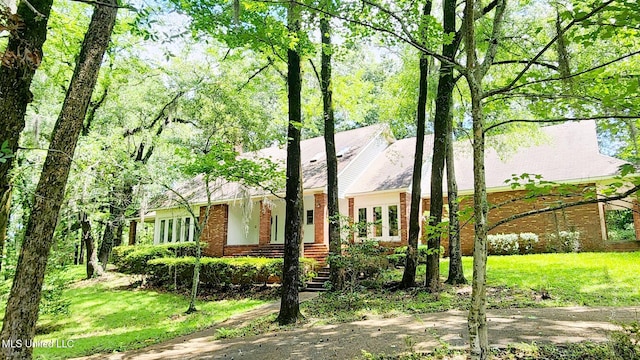 view of front of property with a front lawn