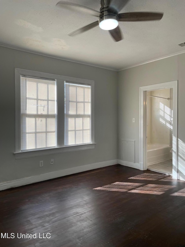 409 E Mayes St Unit 1, 2, 3, Jackson, MS 39206 - unfurnished room featuring dark wood finished floors, a ceiling fan, baseboards, ornamental molding, and a textured ceiling