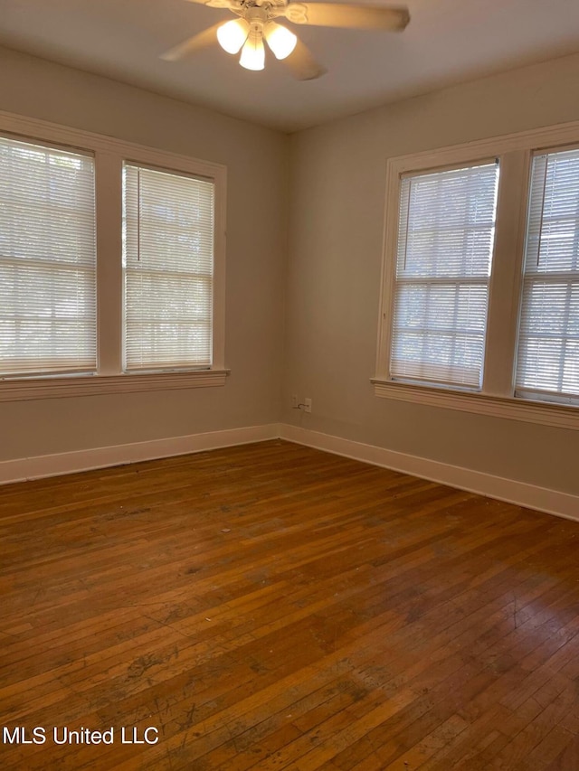 409 E Mayes St Unit 1, 2, 3, Jackson, MS 39206 - empty room with dark wood finished floors, ceiling fan, and healthy amount of natural light