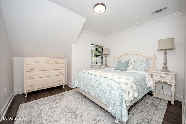 2011 Ivy Ct, Biloxi, MS 39532 - bedroom with baseboards, dark wood-style flooring, crown molding, and visible vents