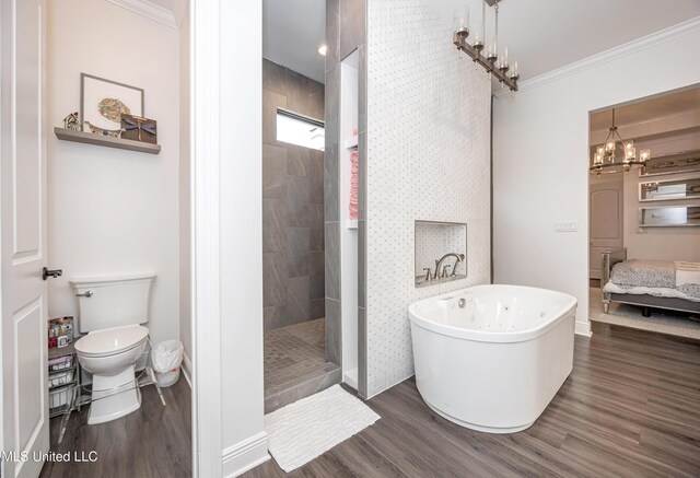 2011 Ivy Ct, Biloxi, MS 39532 - ensuite bathroom with a freestanding bath, toilet, wood finished floors, and a walk in shower