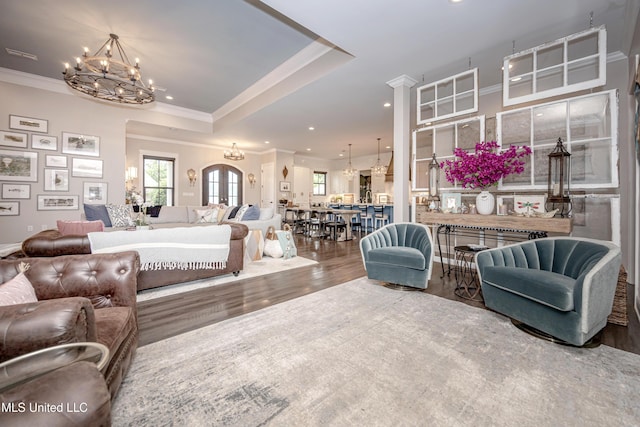 2011 Ivy Ct, Biloxi, MS 39532 - living area featuring a chandelier, ornamental molding, recessed lighting, and wood finished floors