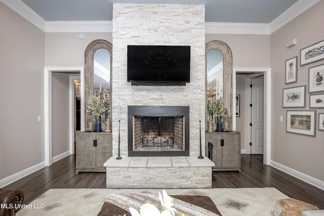 2011 Ivy Ct, Biloxi, MS 39532 - living area featuring a fireplace, ornamental molding, baseboards, and wood finished floors