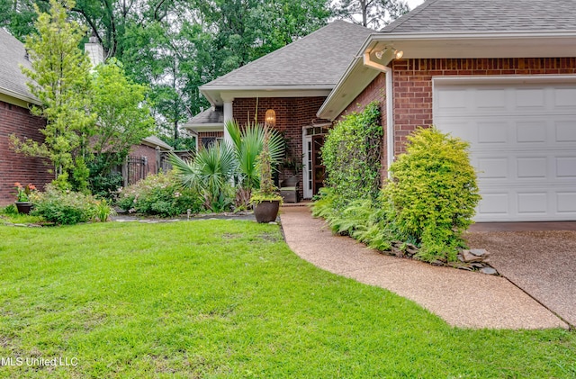 3 Carriage Court Pl, Brandon, MS 39047 - view of front of property featuring brick siding, a shingled roof, a front lawn, and a garage