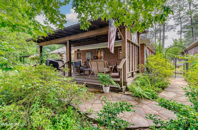 3 Carriage Court Pl, Brandon, MS 39047 - rear view of house with a deck and brick siding