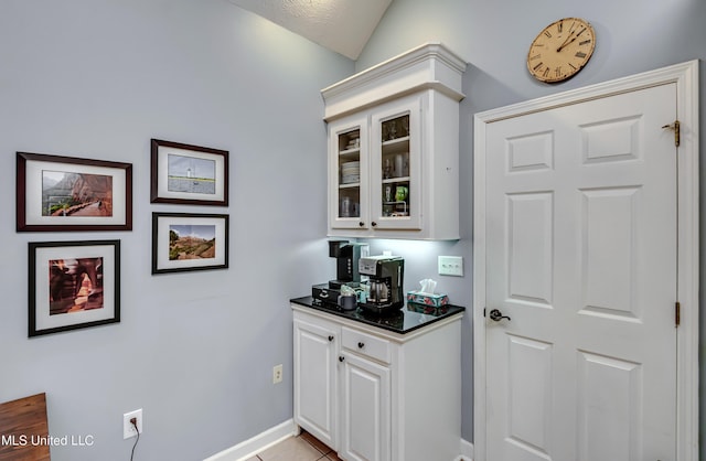 3 Carriage Court Pl, Brandon, MS 39047 - bar featuring baseboards and light tile patterned floors