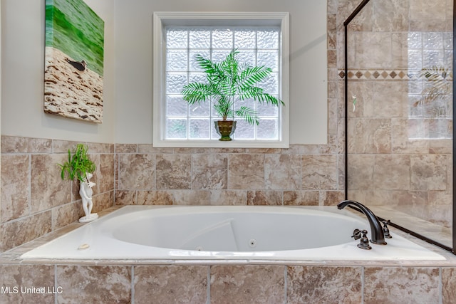 3 Carriage Court Pl, Brandon, MS 39047 - bathroom featuring plenty of natural light and a jetted tub