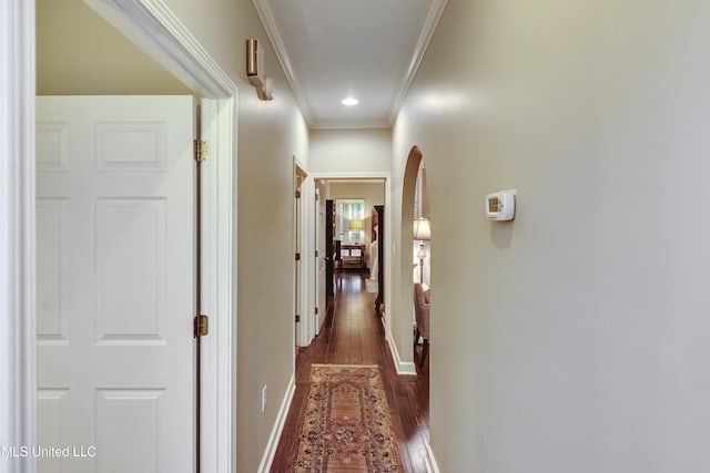 3 Carriage Court Pl, Brandon, MS 39047 - hallway with crown molding, dark wood-style flooring, baseboards, arched walkways, and recessed lighting
