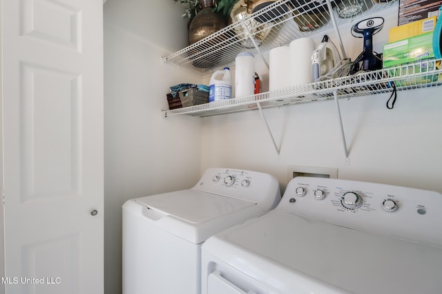 laundry area featuring laundry area and washing machine and dryer