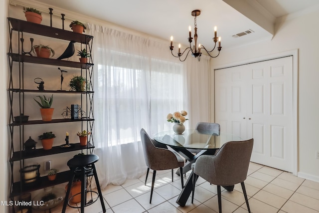 tiled dining space with a chandelier, visible vents, a healthy amount of sunlight, and crown molding