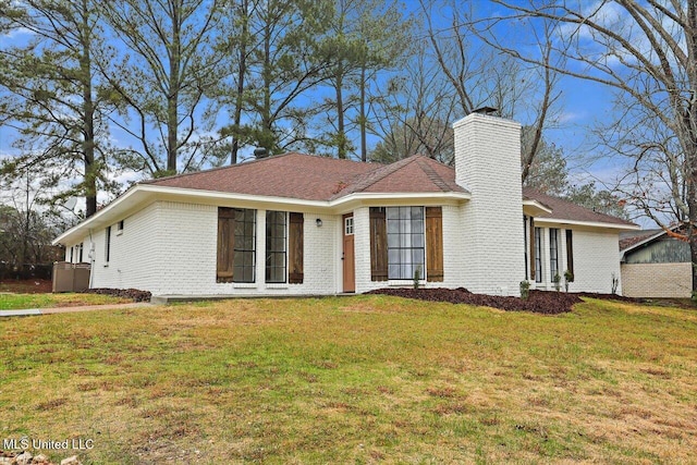 1505 Rosemont Dr, Clinton, MS 39056 - single story home with a chimney, a front lawn, and brick siding