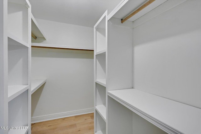1505 Rosemont Dr, Clinton, MS 39056 - spacious closet with wood finished floors