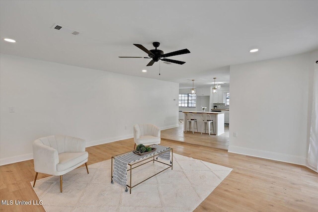 1505 Rosemont Dr, Clinton, MS 39056 - unfurnished living room featuring baseboards, ceiling fan, light wood-type flooring, and recessed lighting