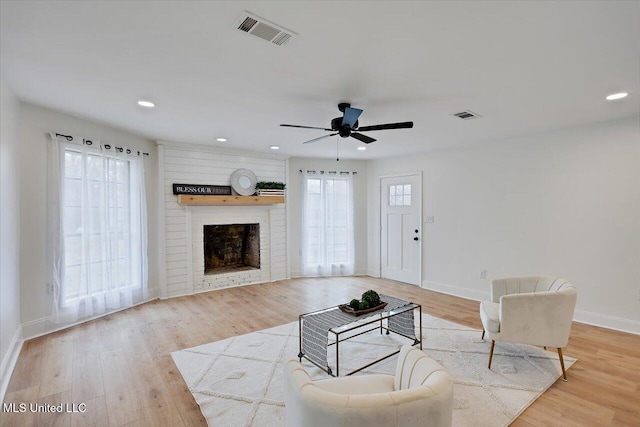 1505 Rosemont Dr, Clinton, MS 39056 - living room with baseboards, a ceiling fan, a fireplace, recessed lighting, and light wood finished floors