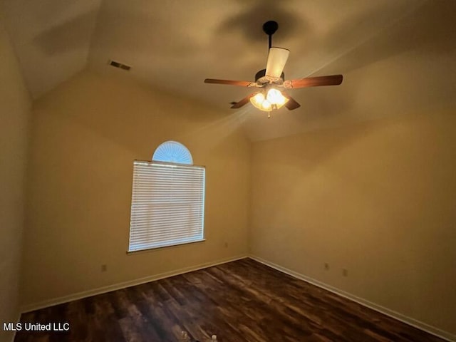 unfurnished room featuring ceiling fan, lofted ceiling, and dark hardwood / wood-style floors